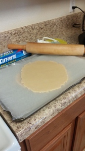 Pre-rolled sugar cookie dough ready to be chilled